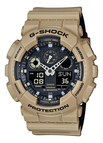 Reloj pulsera Casio G-Shock GA100 de cuerpo color beige, analógico-digital,  para hombre, fondo negro, con correa de resina color beige y negro, agujas  color blanco, dial gris y amarillo, subesferas color negro