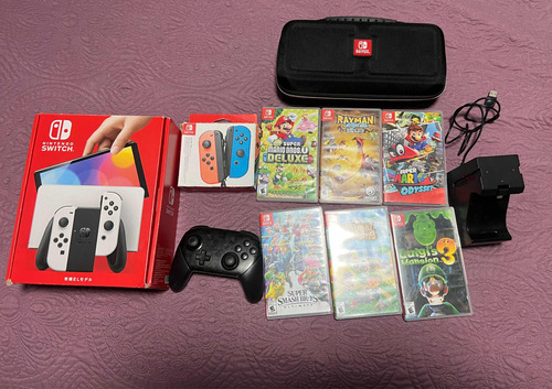 Nintendo Switch Oled 64 Gb + 6 Juegos Y 4 Accesorios