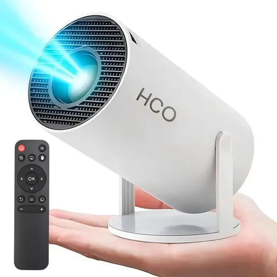Proyector Portatil Wifi Hdmi Mini Led Marca HomeCo. (Hco) Color Blanco Smart Inteligente 160 Lúmenes Ansi Resolucion 1280×720p Giro 360° 110 Cable 1.2m Cine En Casa Meet Educacion Infantil