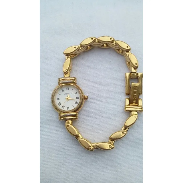 Reloj Michele Tipo Joya Dama Acero Baño Oro Modelo 72-144-rv