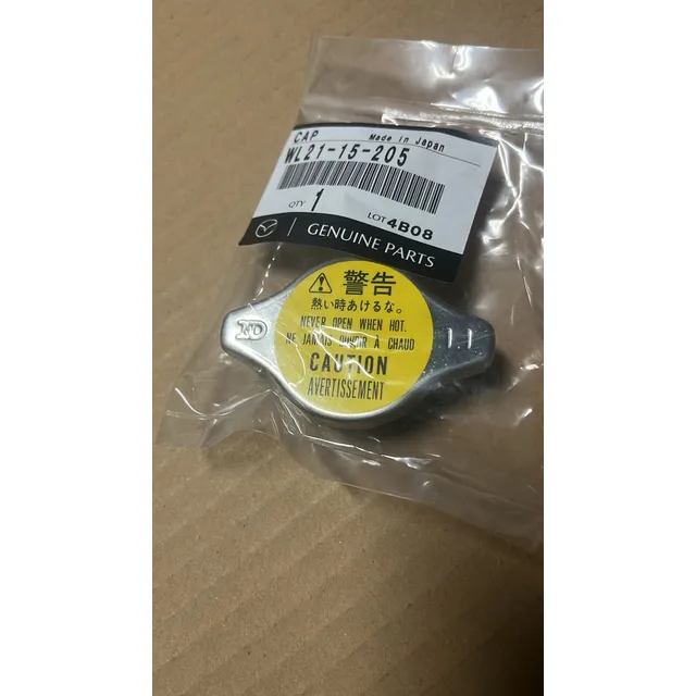 Tapa De Radiador Mazda Demio Original