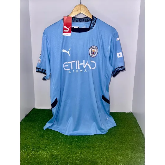 Franela Manchester City Local