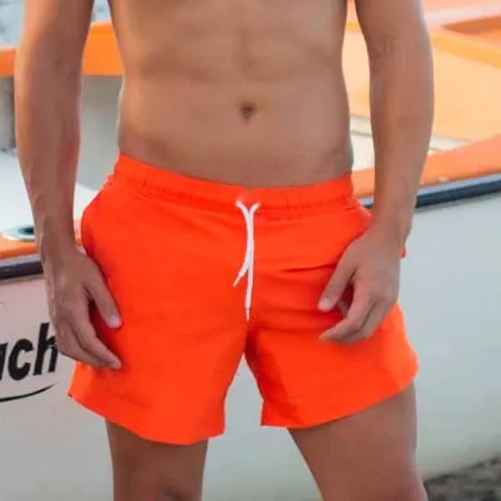 Seleski .swimwear. Short Unicolor Naranja Neón