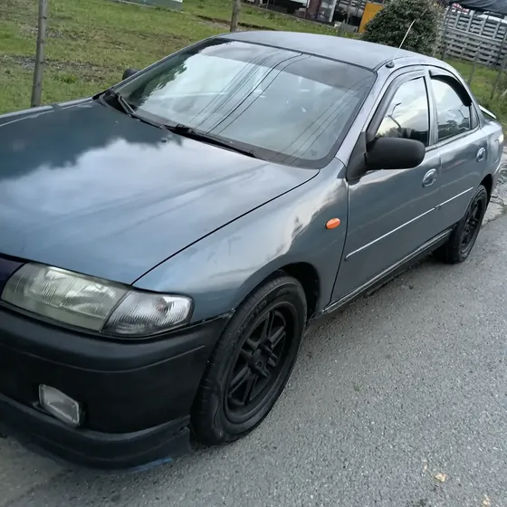 Mazda Allegro 1999 1.3 323n3m
