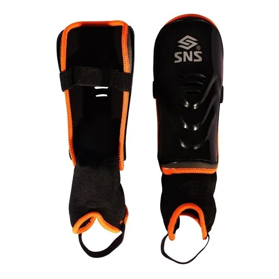 Canillera Hockey Césped Sns Torque Niño Naranja