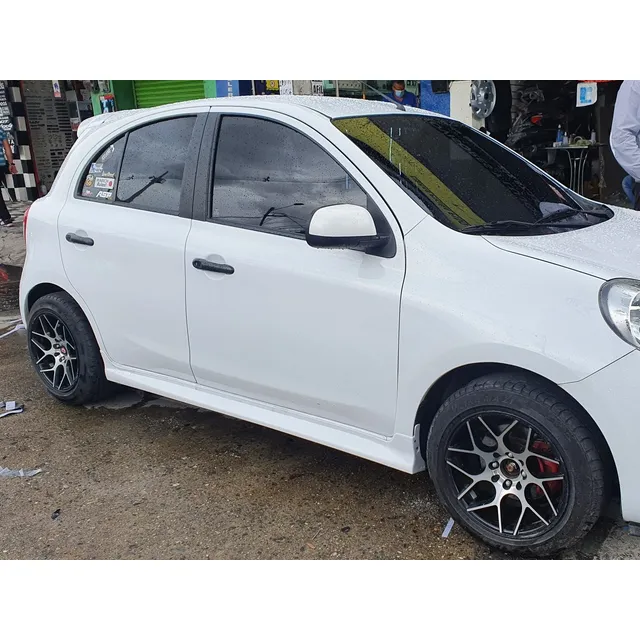 Spoiler Y Estribos Nissan March