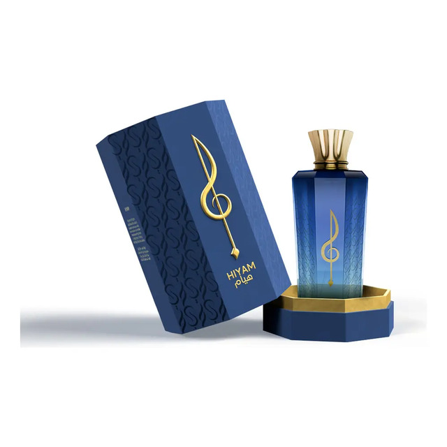 Frasco de perfume azul retangular com tampa dourada e caixa azul com símbolo de clave de sol dourada