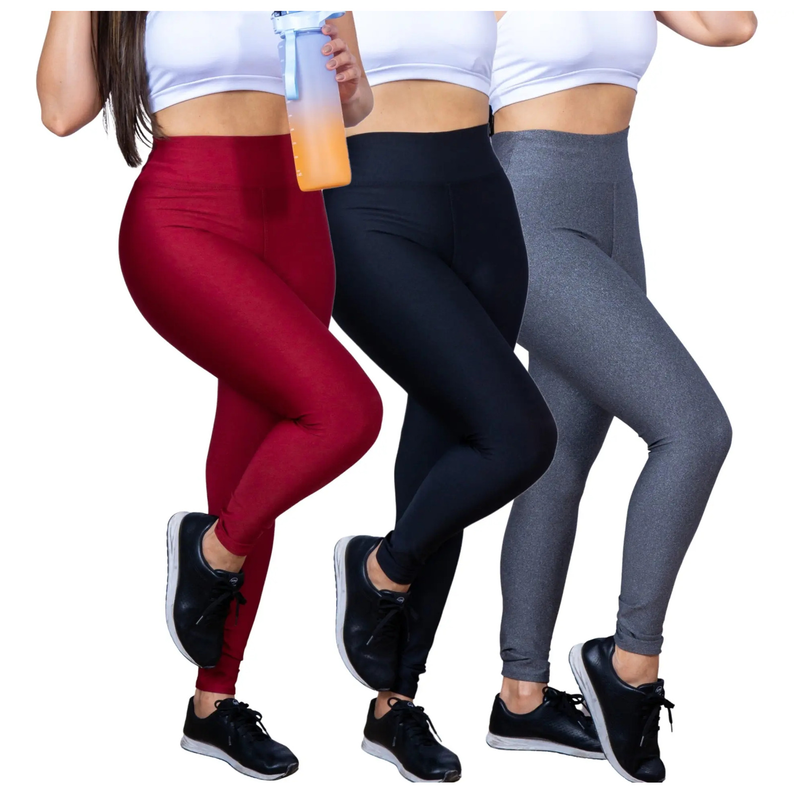 Três modelos vestindo calças legging nas cores vinho, preta e cinza, acompanhadas de tops brancos e tênis pretos, com uma das modelos segurando uma garrafa de água.