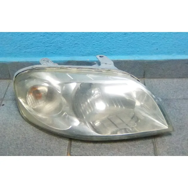 Faro Derecho Aveo 10-12 Reparado Usado