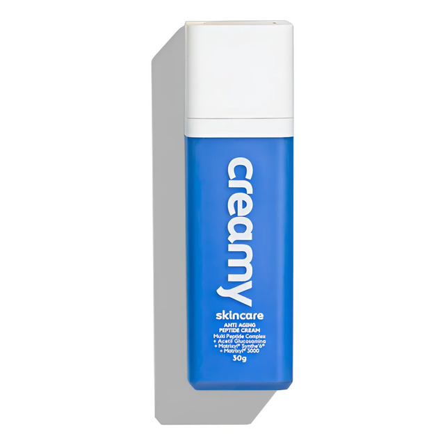 Embalagem do creme anti-idade Creamy Skincare de 30g na cor azul com tampa branca em fundo branco