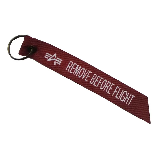 Llavero, Cinta Roja, Remove Before Flight Chaqueta Alpha