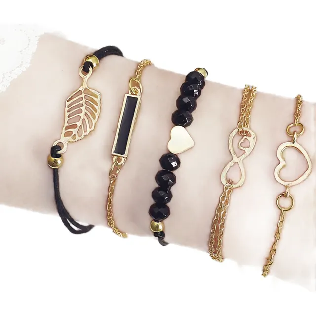 Set De Pulseras Doradas Y Negras