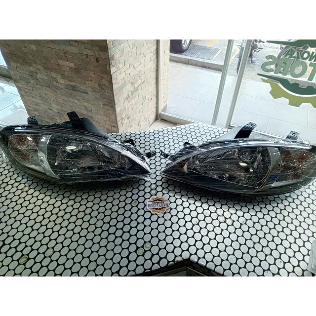 Faro Optra Hatchback Derecho Izquierdo 06-07 