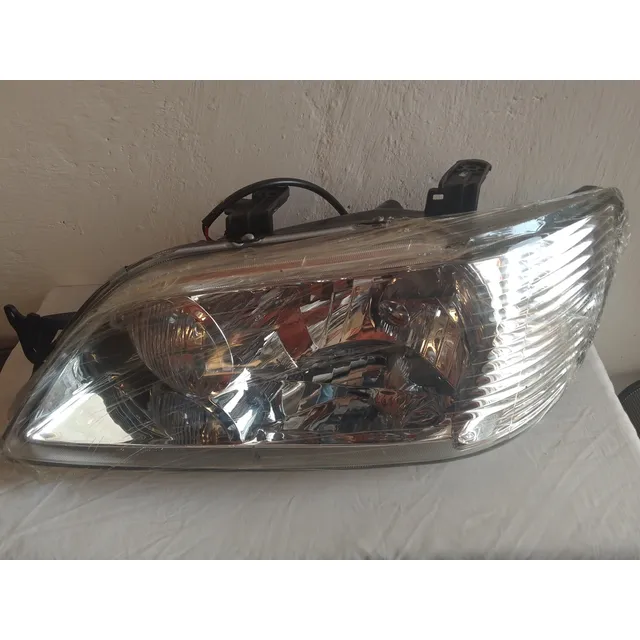 Faro Derecho Lancer Touring 02-04 