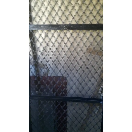 Reja Hierro Con Tejido Puerta Al Medio Y Porta Candado 
