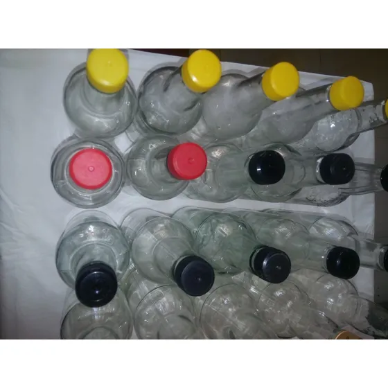 Botellas De Vidrio 1 Litro  Y 0.70 (caracas)