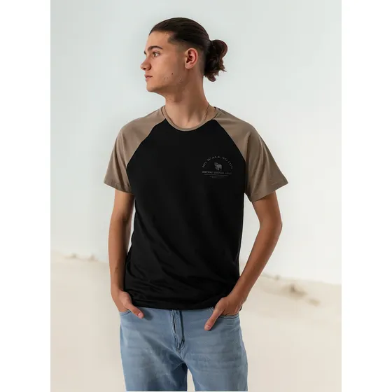 Remera District Amsterdam Hombre Algodón Manga Ranglan Corta