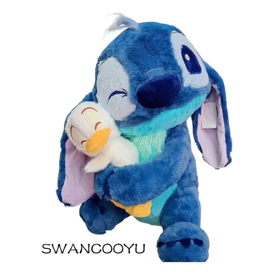Peluche Stitch Guiño Abrazando A Un Pato Lilo & Stitch Color Azul
