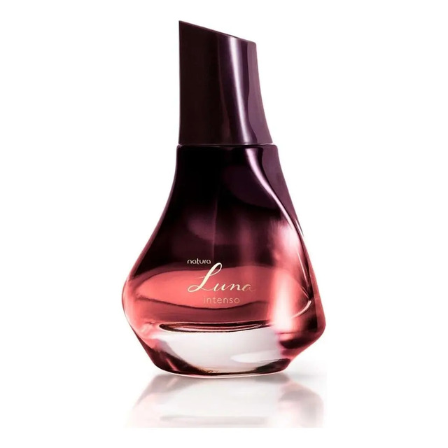 Frasco de vidro do perfume Natura Luna Intenso com design curvo e tom degradê avermelhado em fundo branco