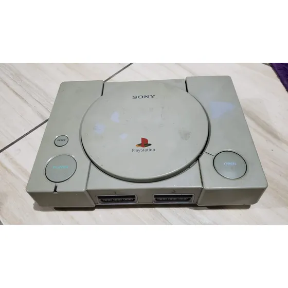 Playstation 1 Fat Só O Aparelho. O Leitor Não Leu Os Jogos. Tá Com Defeito. 025.  M61