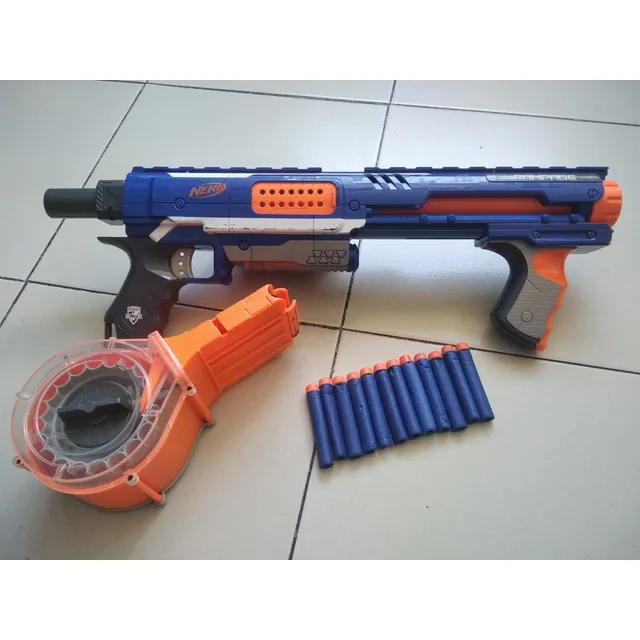Pistola Nerf Con Tambor De Balines Desprendible