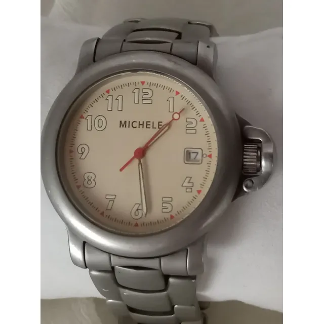 Reloj De Caballero, Michele. 