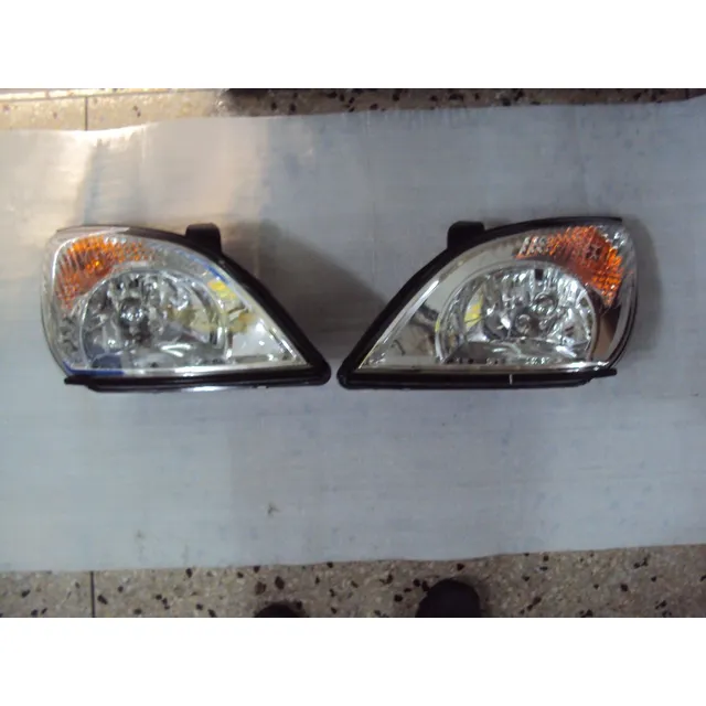 Faro Chery Tiggo Lh/rh Marca Apw