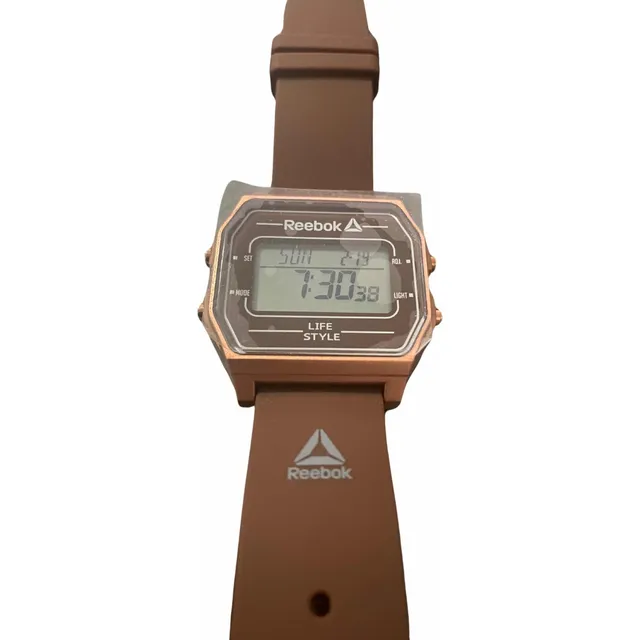 Reloj Café Reebok Unisex Mod.rdvneg9p3ij Digital