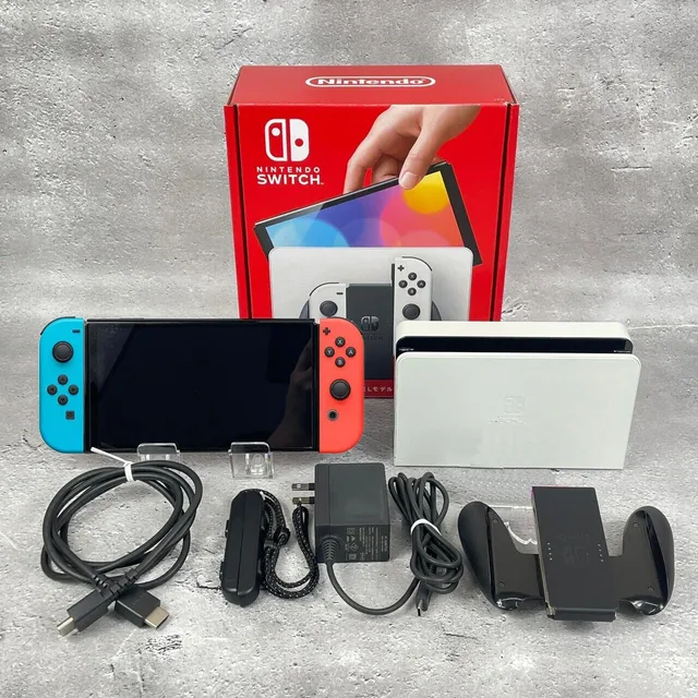Nintendo Switch Oled 64gb Blanco/negro. Joycons Azul Y Rojo
