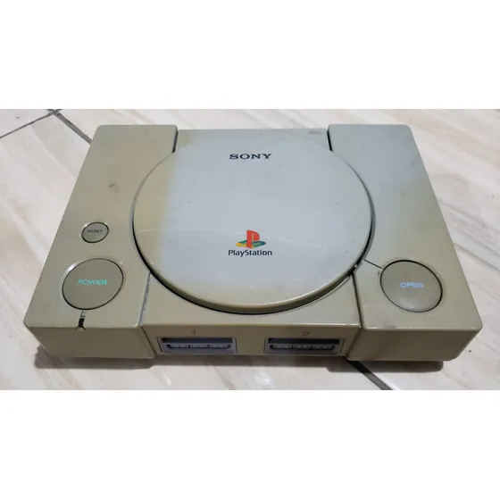 Playstation 1 Fat Só O Aparelho. O Leitor Não Leu Os Jogos. Tá Com Defeito. 576.  M50