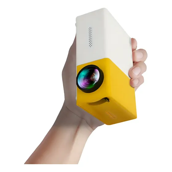 Miniproyector portátil Yg300 LED 1080p 600 lúmenes HD Cinebox color amarillo | Cuotas sin interés