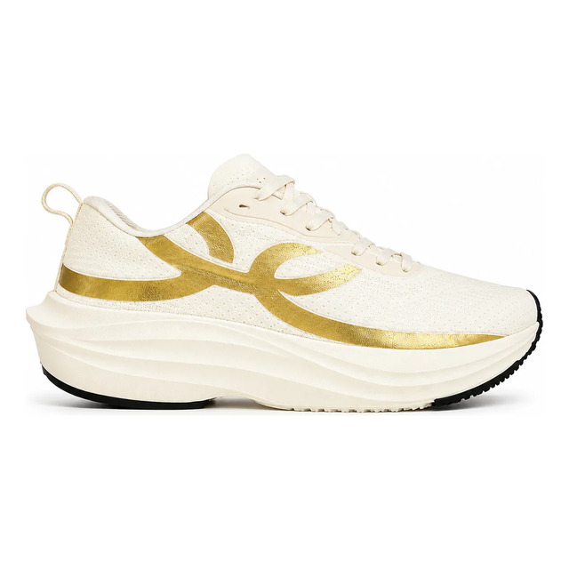 Tênis feminino Olympikus na cor branca com detalhes dourados em formato de onda na lateral, exibindo solado alto e robusto para performance esportiva.