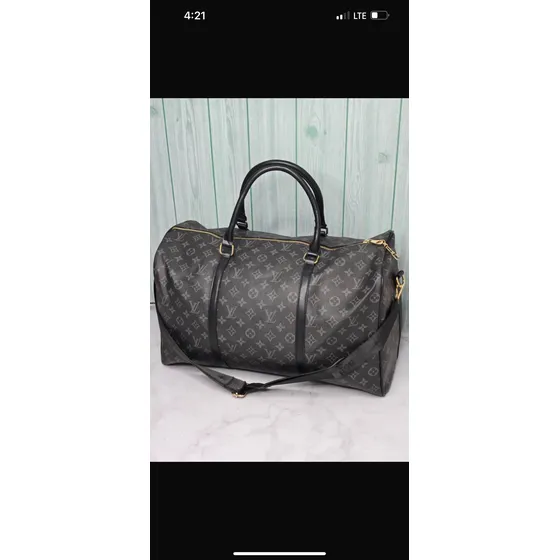 Bolso Viajero - Louis Vuitton- Coach