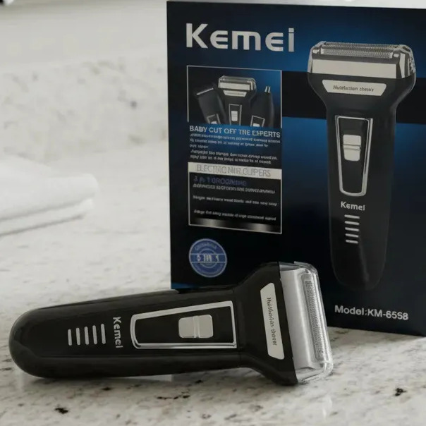 Aparador Barbeador Kemei KM-6558 Recarregável Sem Fio 3 em 1 Bivolt Preto Aparador Barbeador Kemei KM-6558 Recarregável Sem Fio 3 em 1 Bivolt Preto
