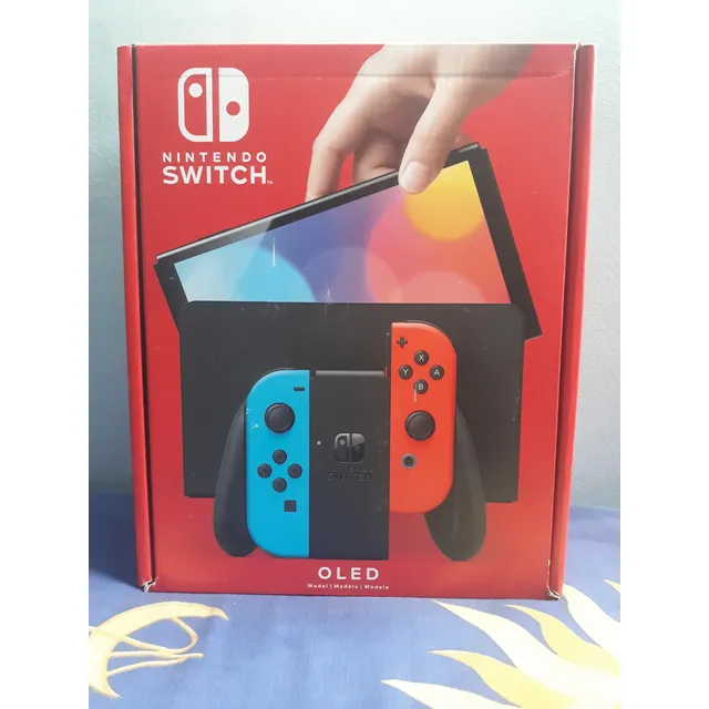 Nintendo Switch Oled Versión Americana + Juego Mario + Forro