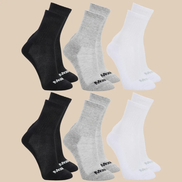 Kit com 6 pares de meias Mash de cano médio nas cores preta, cinza e branca, organizadas em duas fileiras.