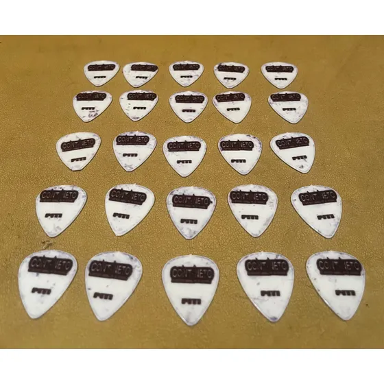 Combo 25 Púas De Guitarra Cont Neto