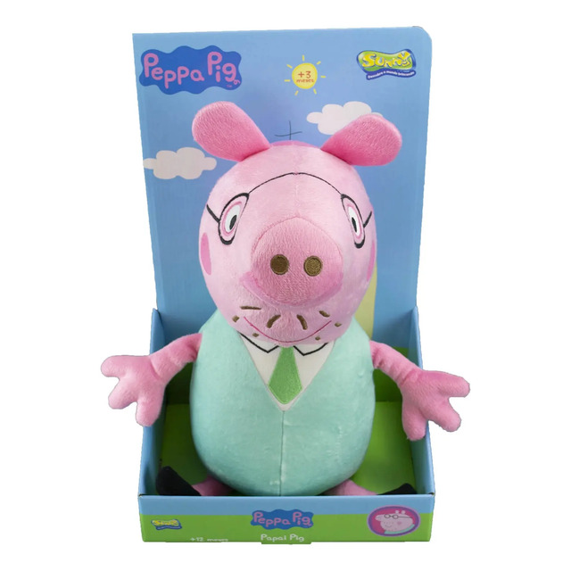 Boneco de pelúcia do Papai Pig, personagem de Peppa Pig, na cor rosa claro com camisa verde, posicionado dentro de sua caixa de embalagem original da marca Sunny.