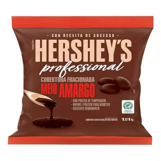 Embalagem de 1,01kg de Cobertura Fracionada Hershey's Professional sabor meio amargo com ilustração de chocolate derretido em uma colher