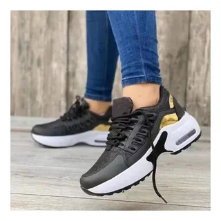 Tenis nike negro con dorado new arrivals