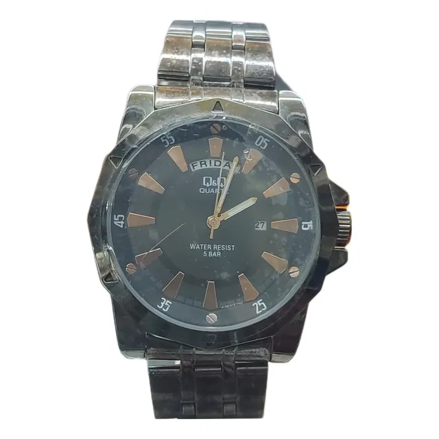 Reloj Q&q