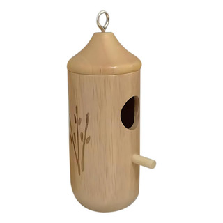 Un Comedero Decorativo Para Pájaros Con Forma De Casa De Col Un Comedero Decorativo Para Pájaros Con Forma De Casa De Col
