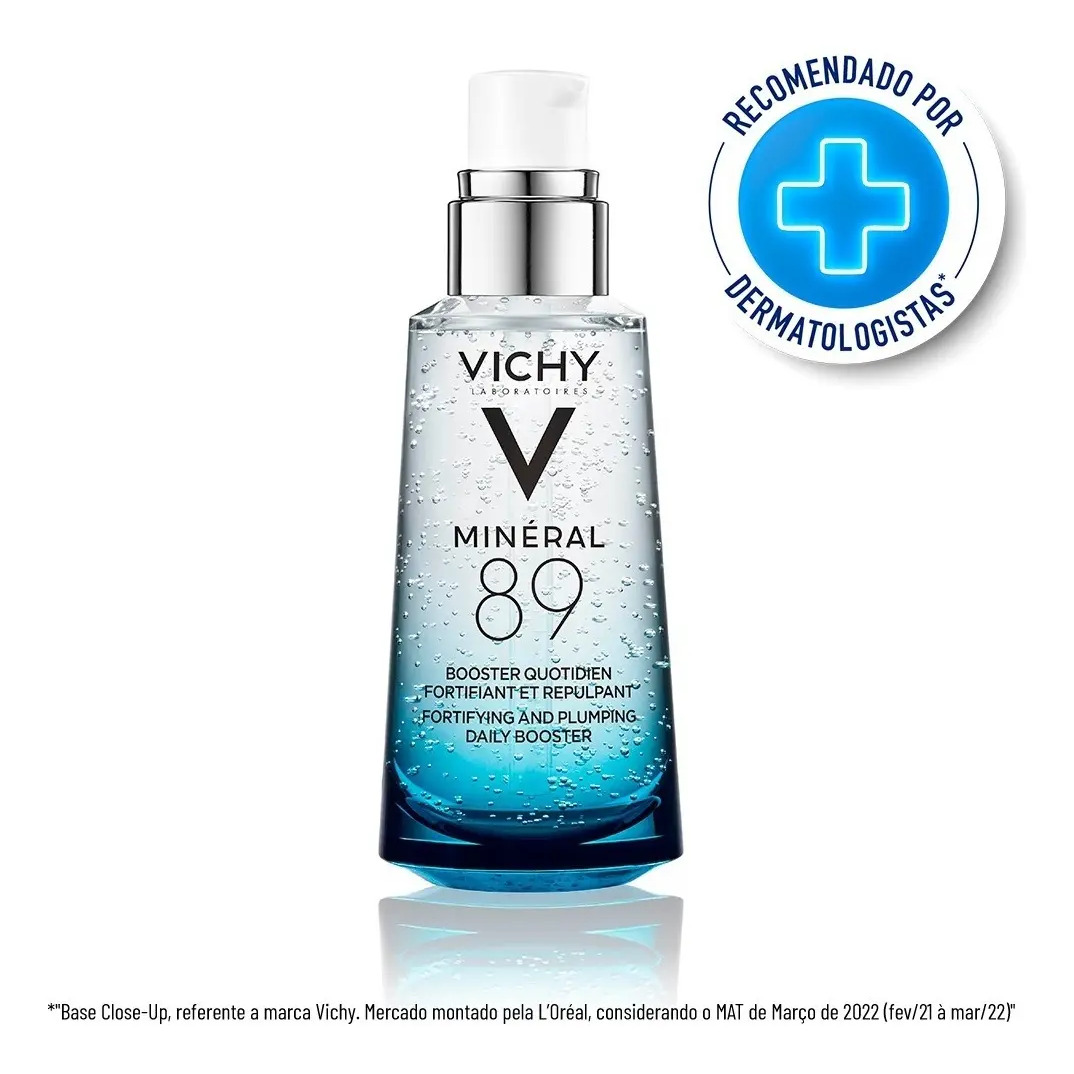Frasco de vidro do sérum facial Vichy Minéral 89 de 50ml com textura em gel, acompanhado de selo de recomendação dermatológica.
