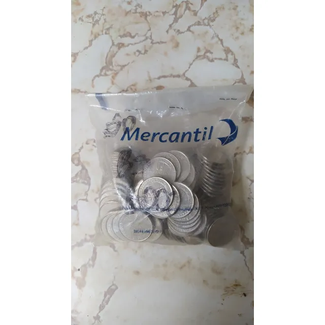 Bolsa Sellada De Monedas Sin Circular. Banco Mercantil, 50¢.