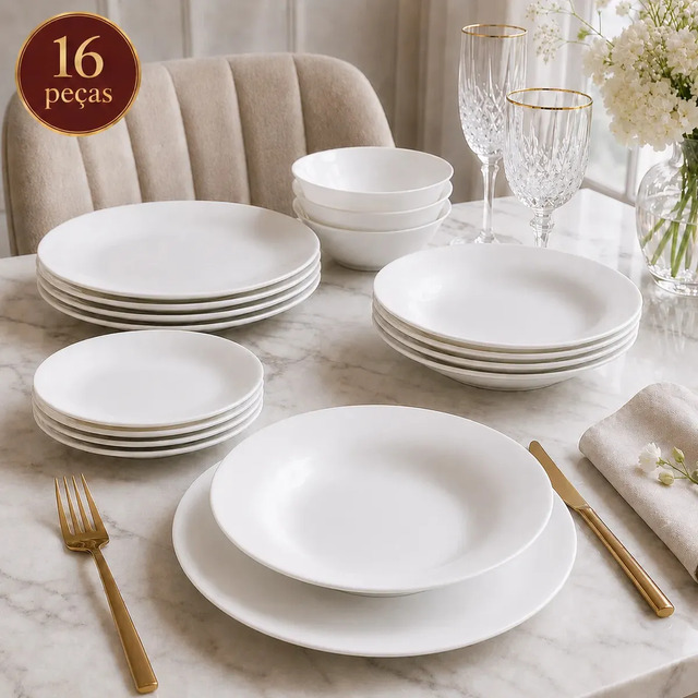 Aparelho de jantar com 16 peças em vidro opalino branco da marca Sólar, incluindo pratos rasos, pratos fundos, bowls e taças sobre uma mesa de mármore.