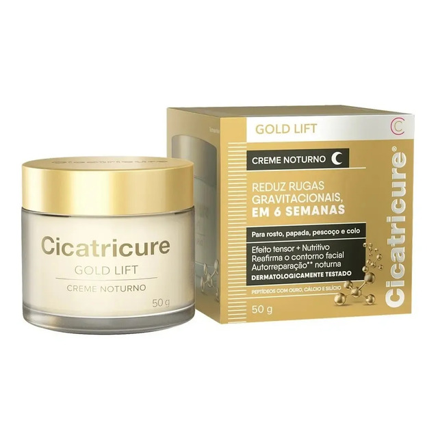Embalagem do creme noturno Cicatricure Gold Lift de 50g ao lado do pote do produto com tampa dourada