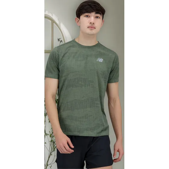 Remera New Balance De Hombre - Mt21263don