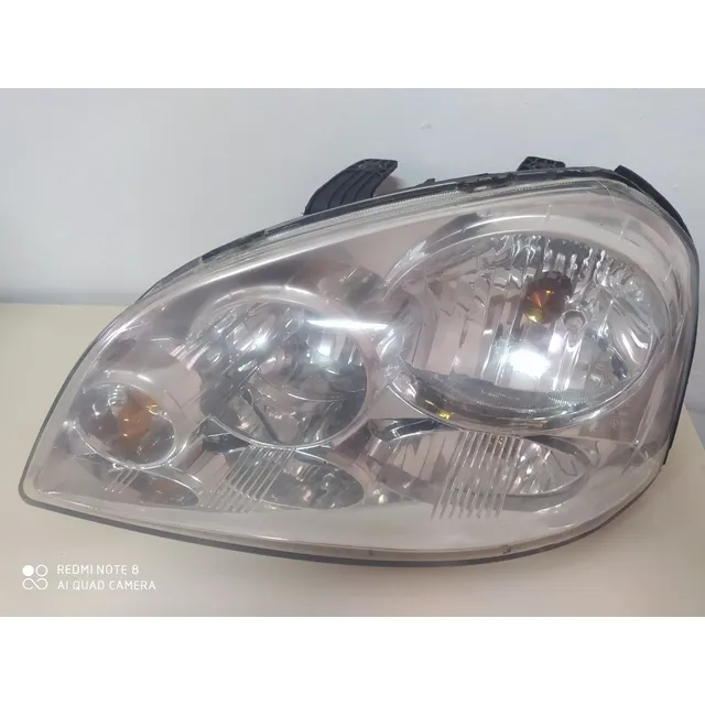 Faro Optra Usado
