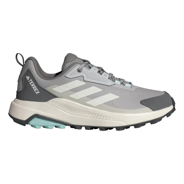 Tênis adidas Terrex Anylander Hiking na cor cinza com detalhes em branco e azul claro, exibindo o solado robusto e o logo Terrex na lateral.