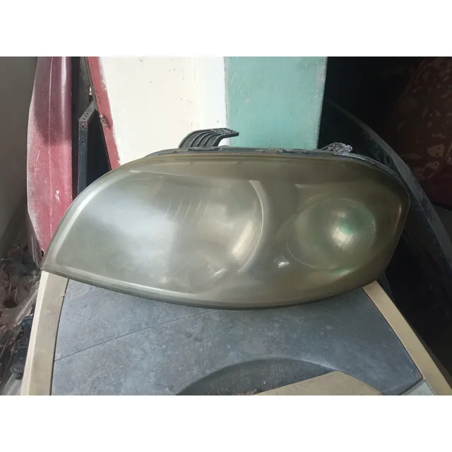 Faro Izquierdo De Aveo Lt 2011/2015 4 Puertas